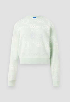 Light green cropped sweater with textured patterns, including smiley faces and celestial motifs, featuring a ribbed neckline and cuffs.