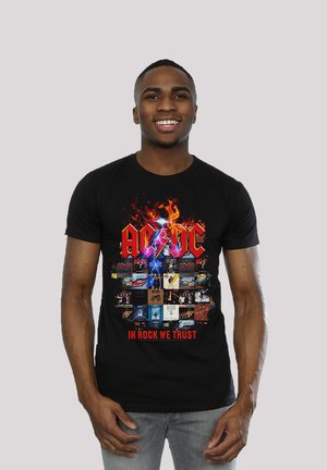 ACDC IN ROCK WE TRUST ALBUM COVERS - ROCK METAL MUSIK BA - Print T-shirt - black