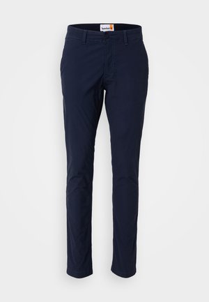 Chinos blu navy in cotone con design a gamba dritta, dotati di chiusura con bottone, passanti per cintura e tasche laterali.