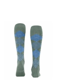 Calzini al ginocchio in tessuto verde con un motivo argyle blu. I polsini a coste e la morbidezza del tessuto accentuano il comfort.