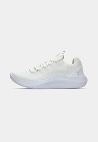 White athletic shoe made of breathable knit material, featuring a textured upper, lace closure, and a thick rubber sole with treads.
