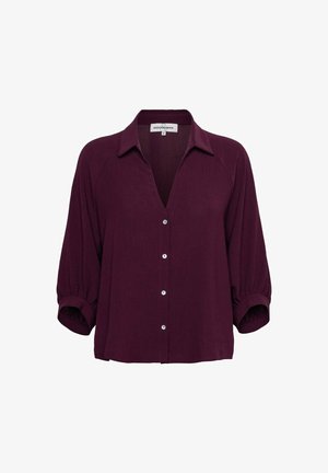 Donkerpaarse blouse met kraag, knoopsluiting aan de voorkant en driekwartlange opgepofte mouwen met elastische manchetten.