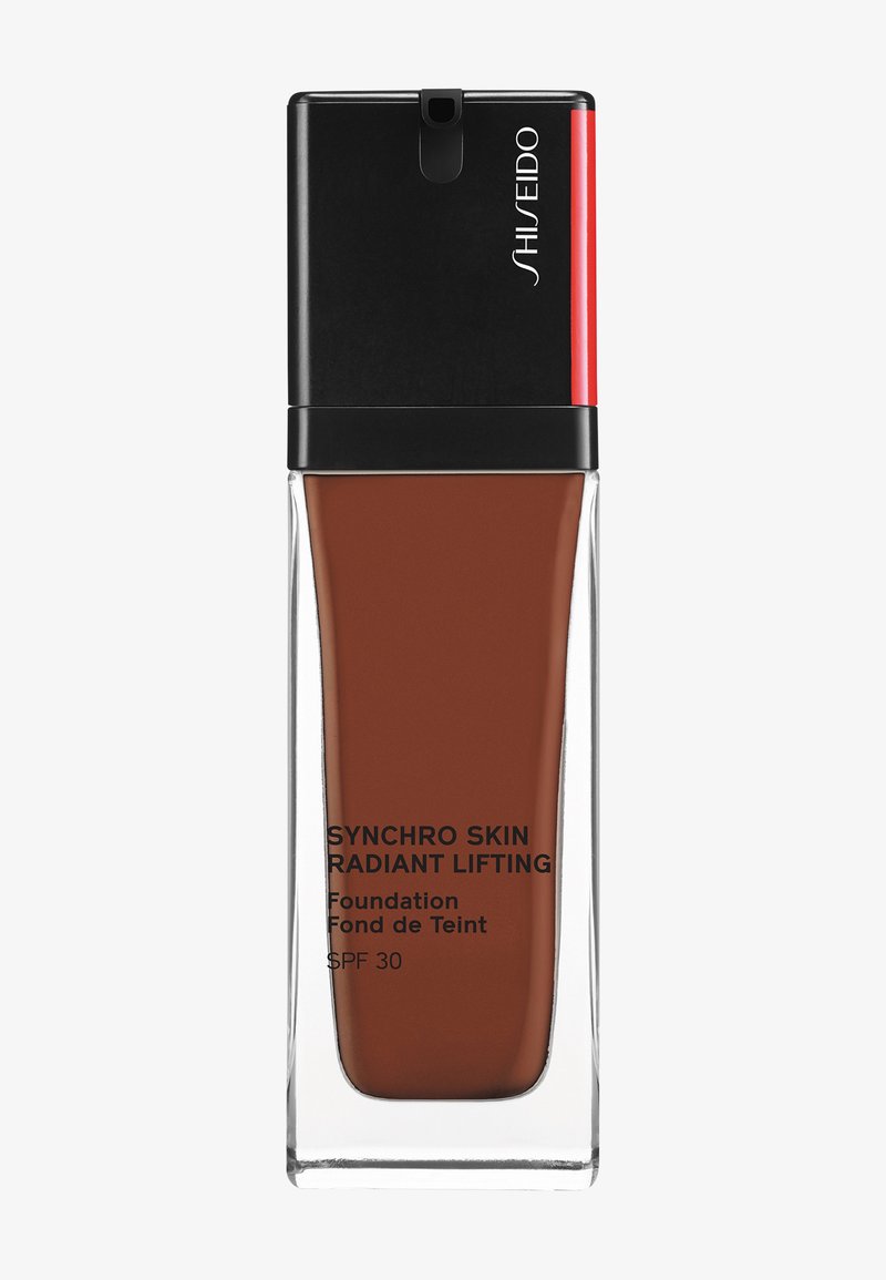 Shiseido SYNCHRO SKIN RADIANT LIFTING FOUNDATION SPF30 - Base de maquillaje - jasper