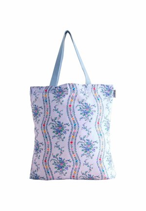 Sac en toile de coton avec un motif floral bleu sur fond blanc. Comprend deux poignées bleu clair et un design spacieux.