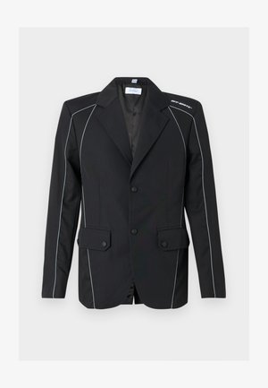 Blazer estructurado negro con ribetes blancos a lo largo de las costuras, dos bolsillos delanteros con solapa, dos botones y el logo "Off-White" en el hombro derecho.