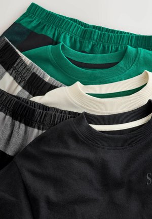 Three T-shirts shown stacked: black with a textured finish, green, and cream with ribbed necklines, plus patterned shorts with an elastic waistband.