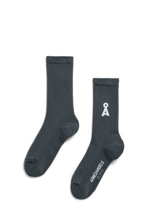 Dunkelgraue gerippte Socken aus einer Baumwollmischung, mit einem weißen Logo und Text an der Seite. Knöchellang mit einem eng anliegenden Sitz.