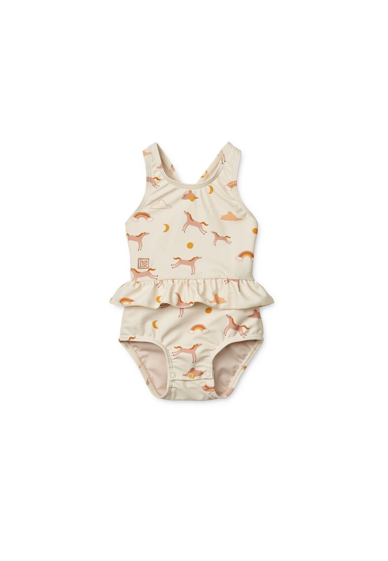 Maillot de bain crème avec une jupe à volants, arborant un motif ludique de chiens roses, de nuages, de soleils et d'arc-en-ciel dans des couleurs pastel douces.