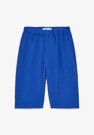 Shorts pour enfants en tissu bleu texturé avec taille élastique et coupe droite.