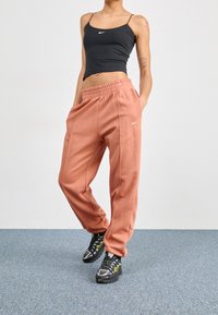 Nike Sportswear Träningsbyxor - beige