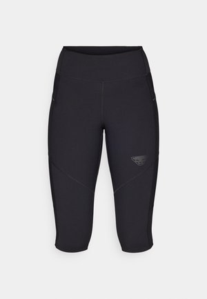 Sorte capri-lengde leggings med en glatt tekstur, med sidelommer og en logo på venstre underlår. Kontraststingedetaljer.