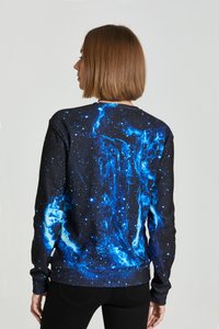 Black sweatshirt featuring a blue galaxy print with stars and nebula-like patterns. Long sleeves and a crew neckline. Soft fabric texture.