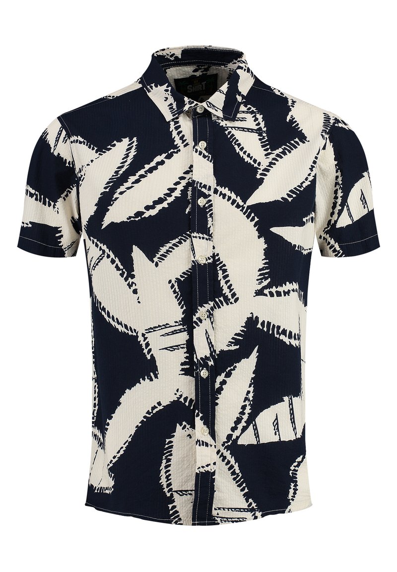 Camicia a maniche corte con un motivo a foglie blu navy e crema, colletto con bottoni e tessuto testurizzato. Bottoni sulla parte anteriore, vestibilità rilassata.