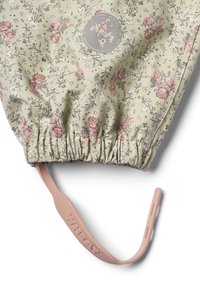 Světle zelená látka se vzorem květin a růžovými květy; elastické stažení dole; růžový gumový pásek s vyraženým nápisem "WHEAT".