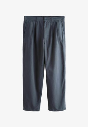 Laivastonsiniset, räätälöidyt housut, joissa on vyölenkit, sivutaskut, edessä laskokset, nappikiinnitys ja vetoketju, esitettynä tasaisena valkoisella taustalla.