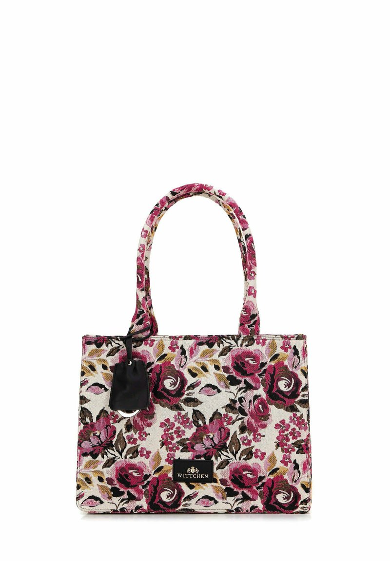 Torba tote w kwiaty charakteryzuje się różowo-czarnym wzorem róż na jasnym tle, mocnymi uchwytami oraz czarną etykietą akcentującą.