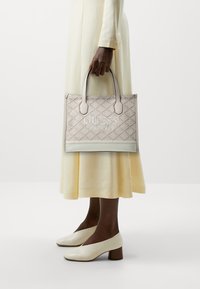 Guess SILVANA COMPARTMENT TOTE - Handbag - stone