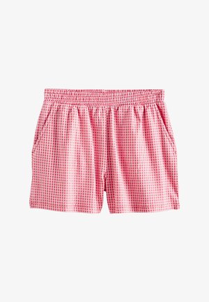 Ružové a červené kockované šortky s elastickým pásom a bočnými vreckami, zobrazené na bielom pozadí.