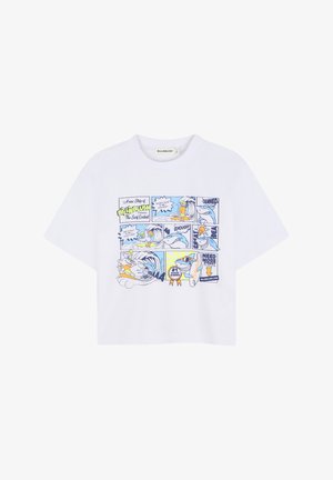 Witte cropped t-shirt met een kleurrijke stripstijl illustratie van surfdieren en tekstelementen. Korte mouwen en een losvallend model.