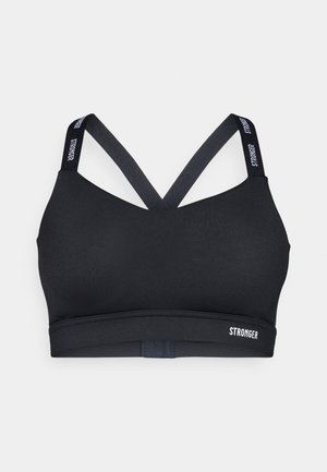 Μαύρο αθλητικό σουτιέν με λεία υφή, διαθέτοντας σταυρωτές ράντες και ελαστική ταινία με λογότυπο. Απλός σχεδιασμός χωρίς σχέδια.
