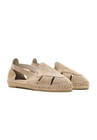 Beige Wildledersandaletten mit ausgeschnittenen Details, mit Jute umwickelten Sohlen und glattem Lederfutter. Sie verfügen über eine abgerundete Zehenpartie und elastische Seiten.