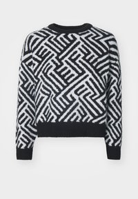 Pull noir et blanc présentant un motif géométrique, col rond et bords côtelés, confectionné dans un matériau en tricot doux et texturé.
