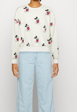 Sudadera blanca corta con un estampado completo de Mickey Mouse con pantalones cortos rojos. Mangas largas con puños de canalé, textura de tela suave.