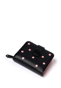 Black leather wallet with pink polka dots, featuring a circular snap closure. Textured surface and a contrasting pink inner lining.