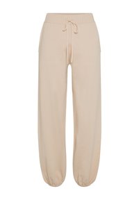 Beige Jogginghosen mit einem dehnbaren, gerippten Bund und verstellbarem Kordelzug. Mit elastischen Bündchen an den Knöcheln und weichem Material.