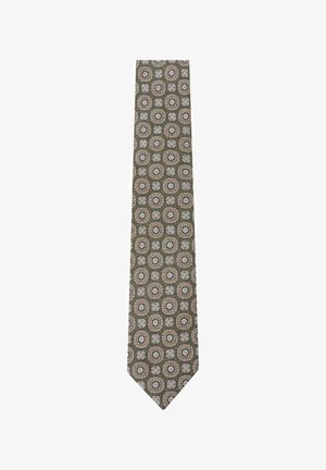 Corbata verde con patrón geométrico floral en beige y blanco, espaciado uniformemente a lo largo de la tela.