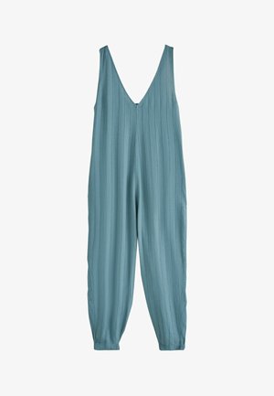 Säärist lahtine varrukateta türkiissinine kombekas, millel on sügav V-kaelus, vertikaalsed tekstuuriga triibud ja kitsenevad sääred, mis on pahkluude juurde kogutud.