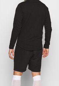 Puma Træningsjakke - black
