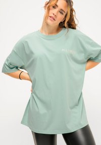 Studio Untold T-Shirt Oversized-Shirt Fanta Halbarm Produktbild-Vorschau 10