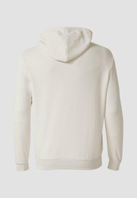 Kapturowa bluza w kolorze écru, z długimi rękawami i prążkowanym dołem. Miękka faktura materiału o prostym, czystym designie.