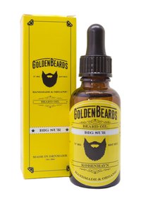 Burgunderfärgad glasflaska med svart droppkork, gul etikett med "GoldenBeards" logotyp och texten "Big Sur", presenterad i en matchande gul låda.