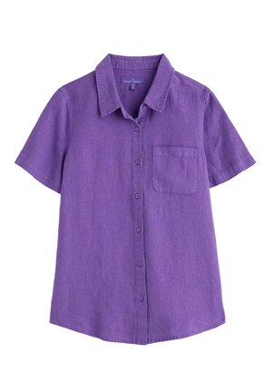 Short-sleeve button-up shirt in solid purple linen. Features a spread collar and a single chest pocket. Lightweight and relaxed fit.