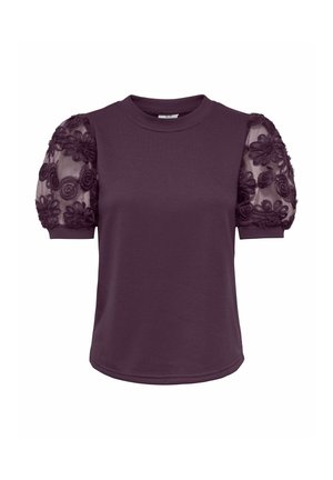 Haut violet foncé à manches courtes avec manches bouffantes transparentes présentant des motifs floraux brodés et un col rond.