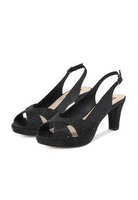 Décolleté neri con cinturino alla caviglia, caratterizzati da punta chiusa, dettagli luccicanti, tessuto testurizzato, tacco medio a blocco e una cintura regolabile.