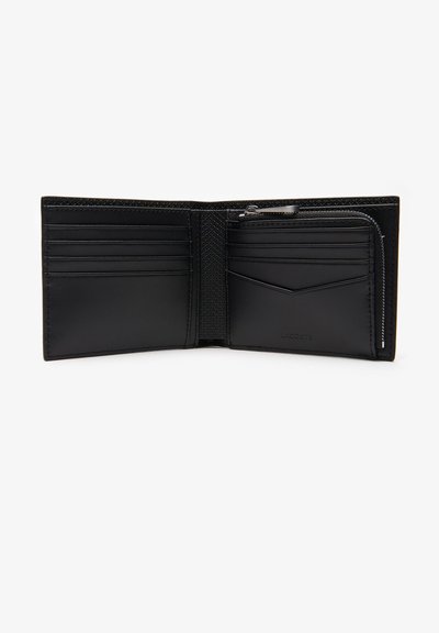 Portefeuille en cuir noir avec plusieurs emplacements pour cartes, une poche à pièces zippée et une texture lisse. Présente un design intérieur épuré et des coutures contrastées.