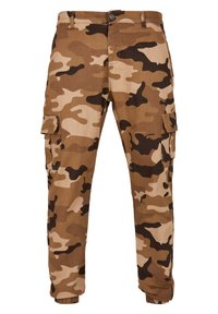Bruine camouflage cargobroek van stof, met een losse fit, zijzakken en elastische boorden bij de enkels.