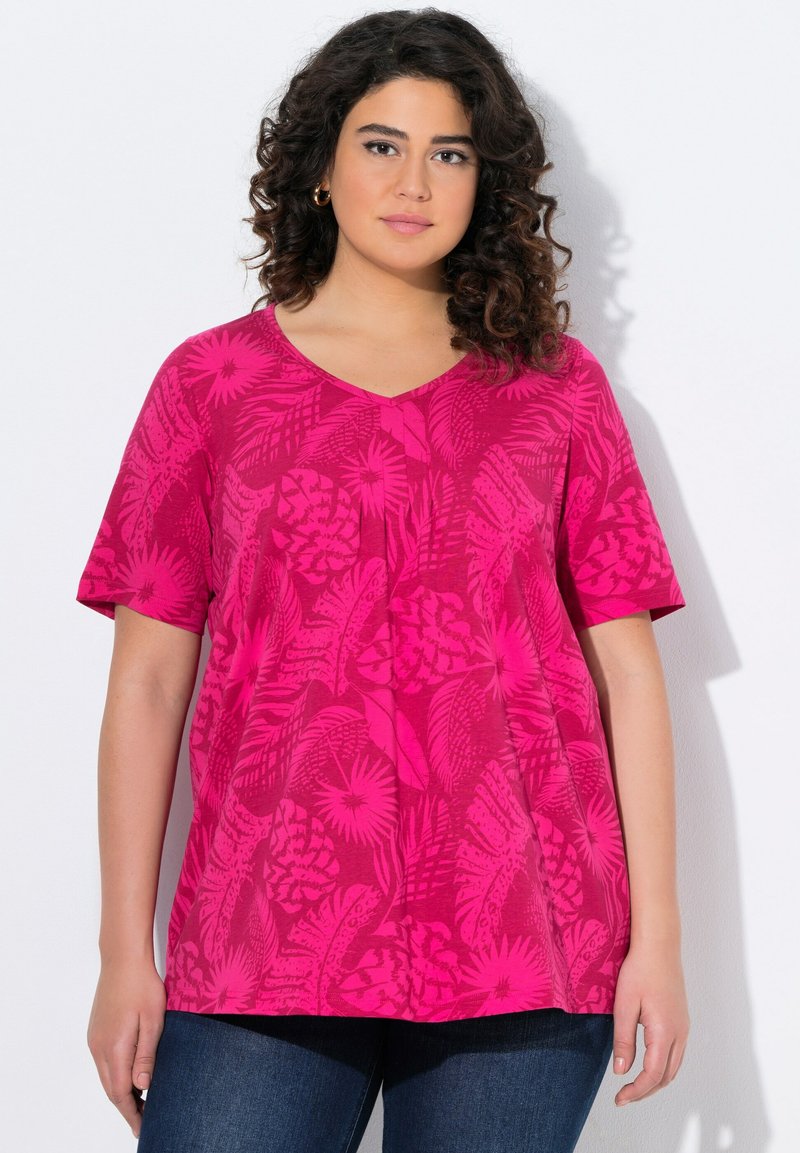 Fuchsiak färgad kortärmad T-shirt med V-ringning som har ett blad- och blommönster, tillverkad av lättviktsmaterial, med en avslappnad passform och rundad nederkant.