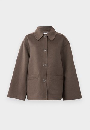 Brown woolen jacket with a collared neck, silver snap buttons, and two front pockets. Features a boxy cut and slightly oversized sleeves.
