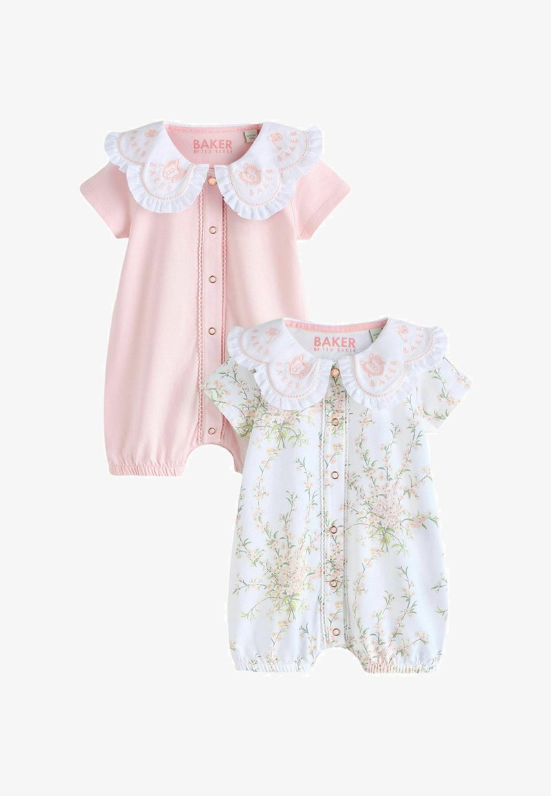 Due tutine per neonati con maniche corte e colletti arricciati; una rosa chiaro, l'altra bianca con una delicata stampa floreale.