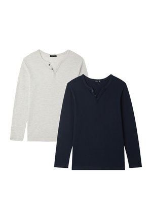 - Bluzka z długim rękawem