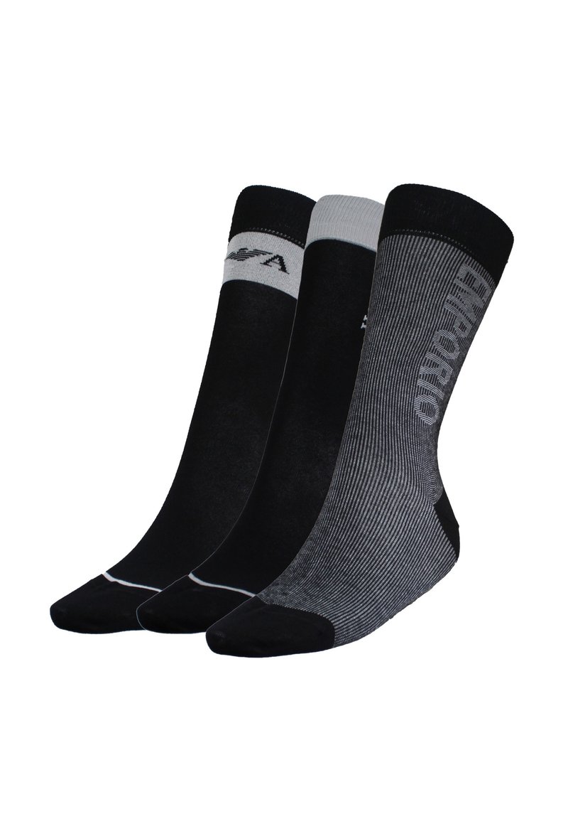 Tres pares de calcetines en negro y gris. Un par es completamente negro, otro tiene acentos en gris claro, y el último presenta rayas negras y grises.