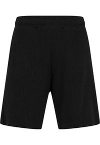 Svarta ribbade shorts med elastisk midja och medellångt snitt, som har en texturerad yta utan ytterligare accenter eller detaljer.