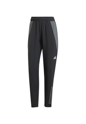 Zwarte sportbroek met grijze accenten, elastische tailleband en taps toelopende pijpen. Bevat reflecterende details aan de zijkanten. Gemaakt van lichtgewicht materiaal.