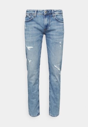 Jeans slim fit azzurri chiari con dettagli strappati sulle cosce e sulle ginocchia, chiusura con bottone frontale e design a cinque tasche.