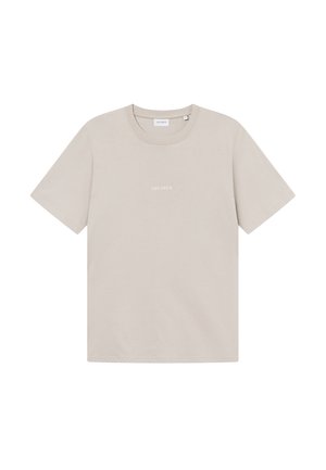 Bežinis medvilninis marškinėliai su trumpomis rankovėmis, apykaklės forma, ir subtiliu baltu tekstu „LES DEUX“ atspausdintu ant priekinės pusės. Lygus paviršius.