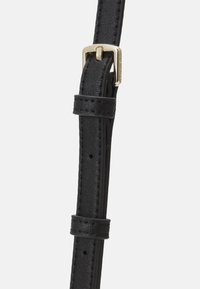 Calvin Klein RE LOCK  - Umhängetasche - black